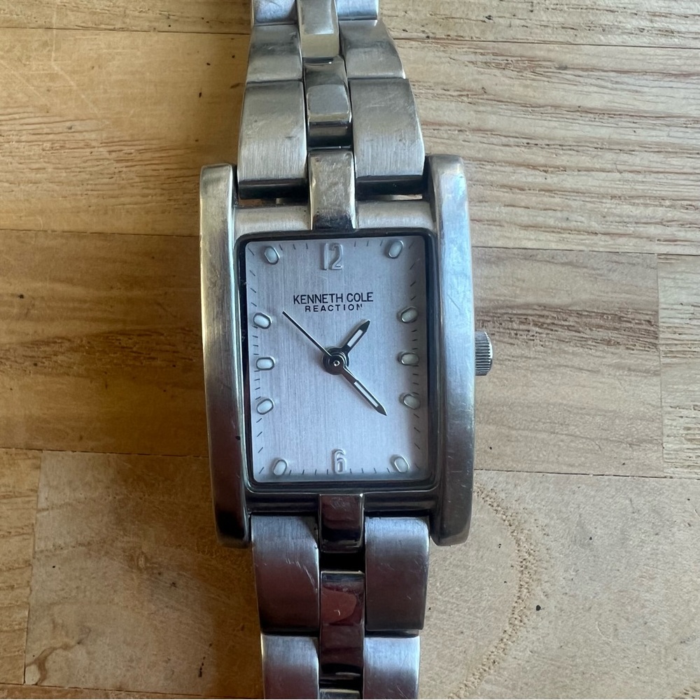 Kenneth Cole reaction silver tone rectangular ladies dress watch NEW BATTERY